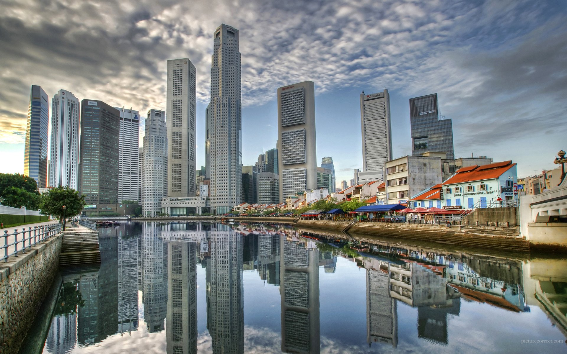 panorama high-rise buildings hundreds of floors the reflection in the water city skyscrapers megapolis usa america shore lake channel water landscape clouds building home