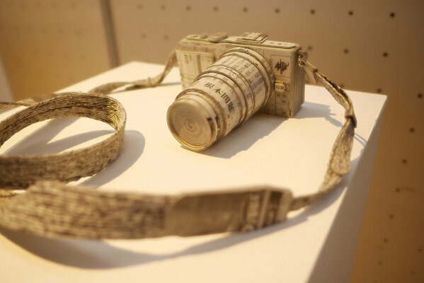 Wooden camera on a white table