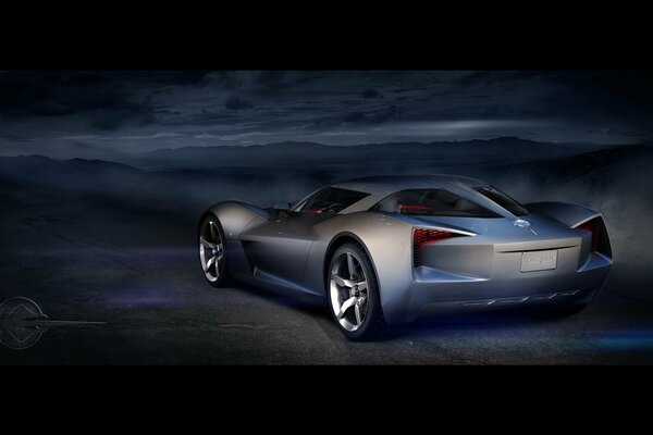 Voiture de sport d argent la nuit