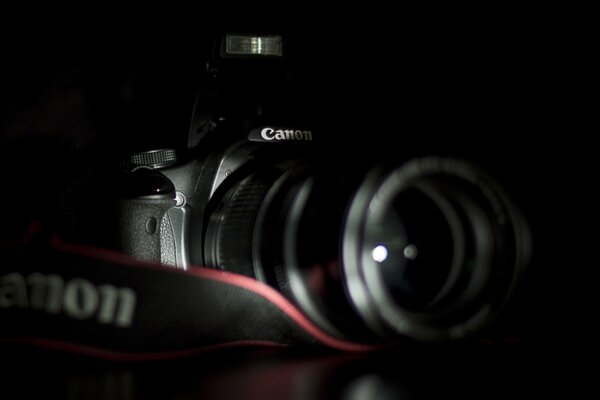 Camera canon on a dark background