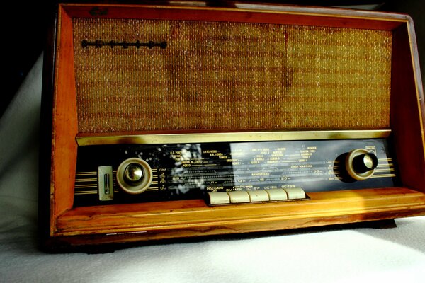 Antique radiola on a white tablecloth