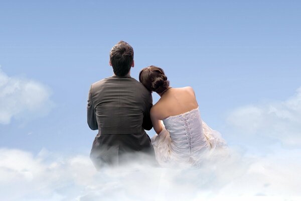 A couple in love enjoys the romance of the blue sky