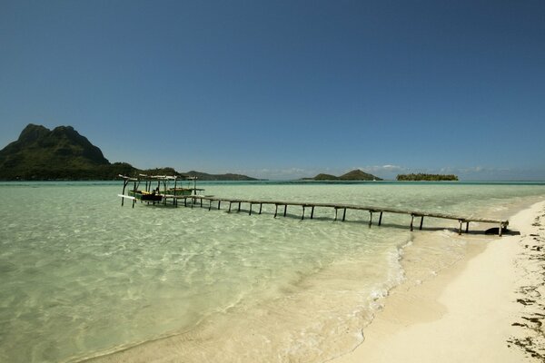 Wooden pier in the sea on the coast
