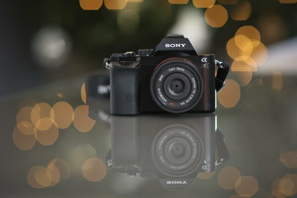 Sony A7 camera on the background of glare and isc