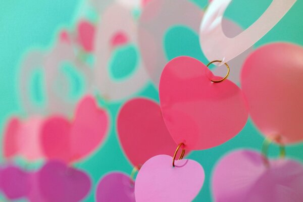 Guirnaldas de papel de corazones y anillos