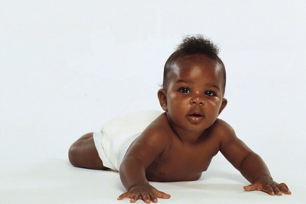 Portrait of a restless little black boy