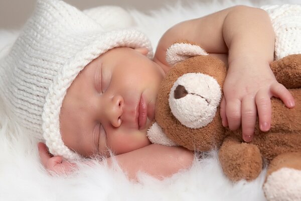 Sweet baby sleep with a toy