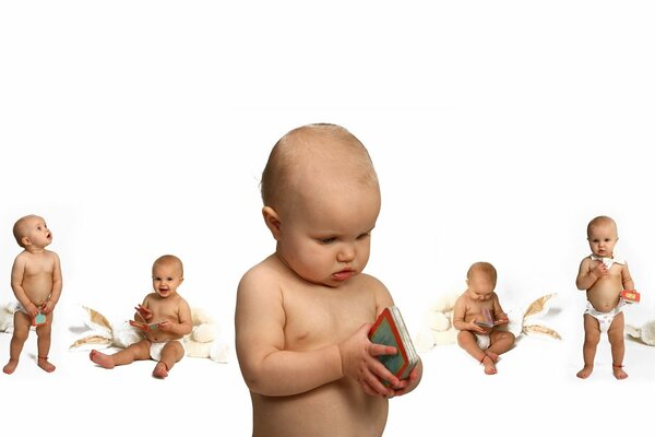A small child looks at pictures