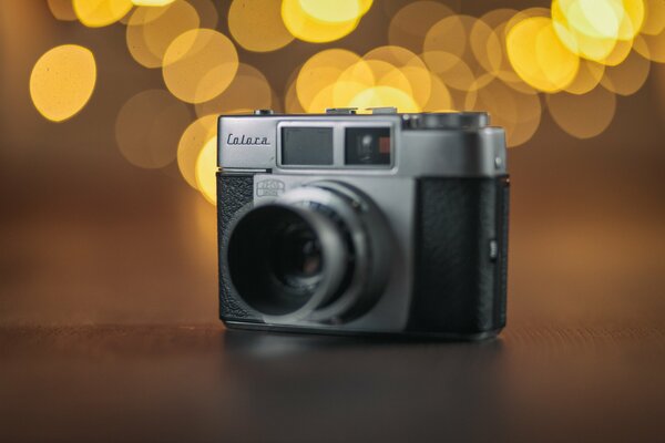 An antique camera is on the table