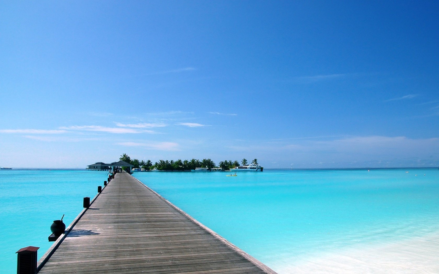 abgerissene insel liegeplatz blaues wasser wasser himmel insel brücken meer pier natur landschaft tropen oberfläche ufer azurblau sommer blau