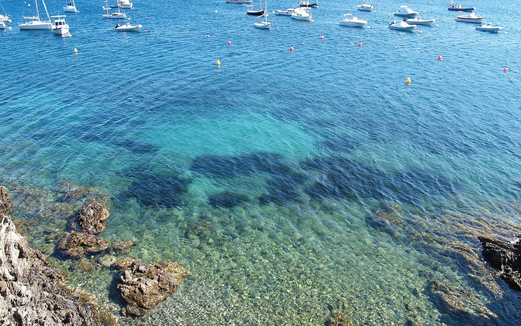 mall pebbles pebbles boats water islands boats view landscape nature azure bottom buoys island tropic