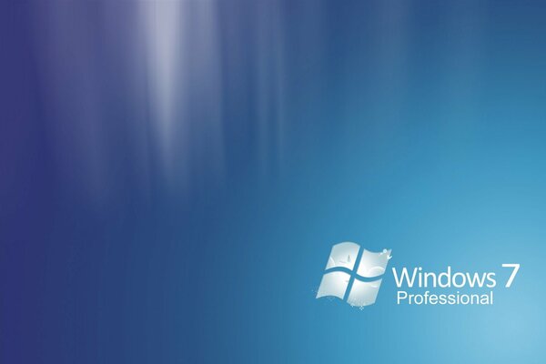 Logo windows seven w rogu na niebieskim tle