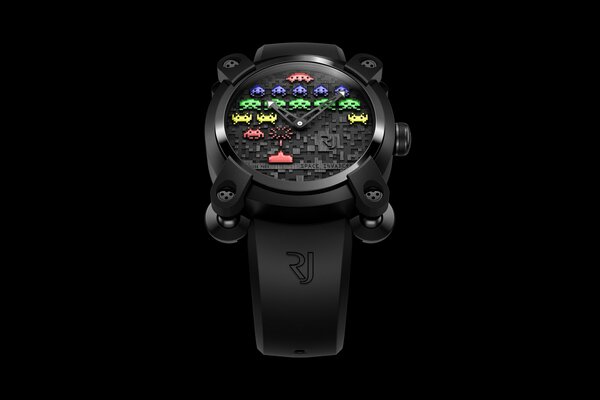 A watch with a colored dial on a black background