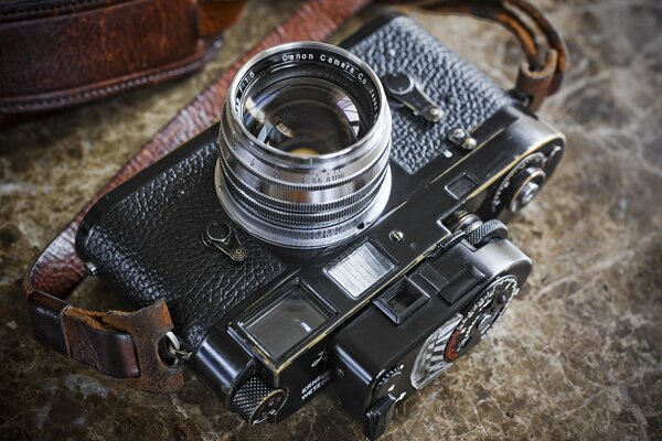 Macro camera Leica m2 on a marble countertop