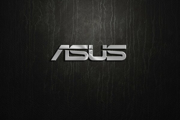 Logotipo de Asus plateado sobre fondo negro