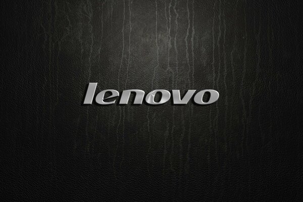 Silbernes Lenovo-Logo auf schwarzem Hintergrund