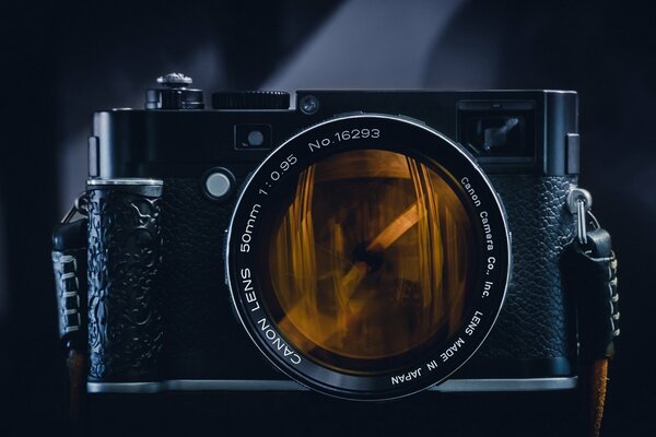 Camera camera on a table in a dark room