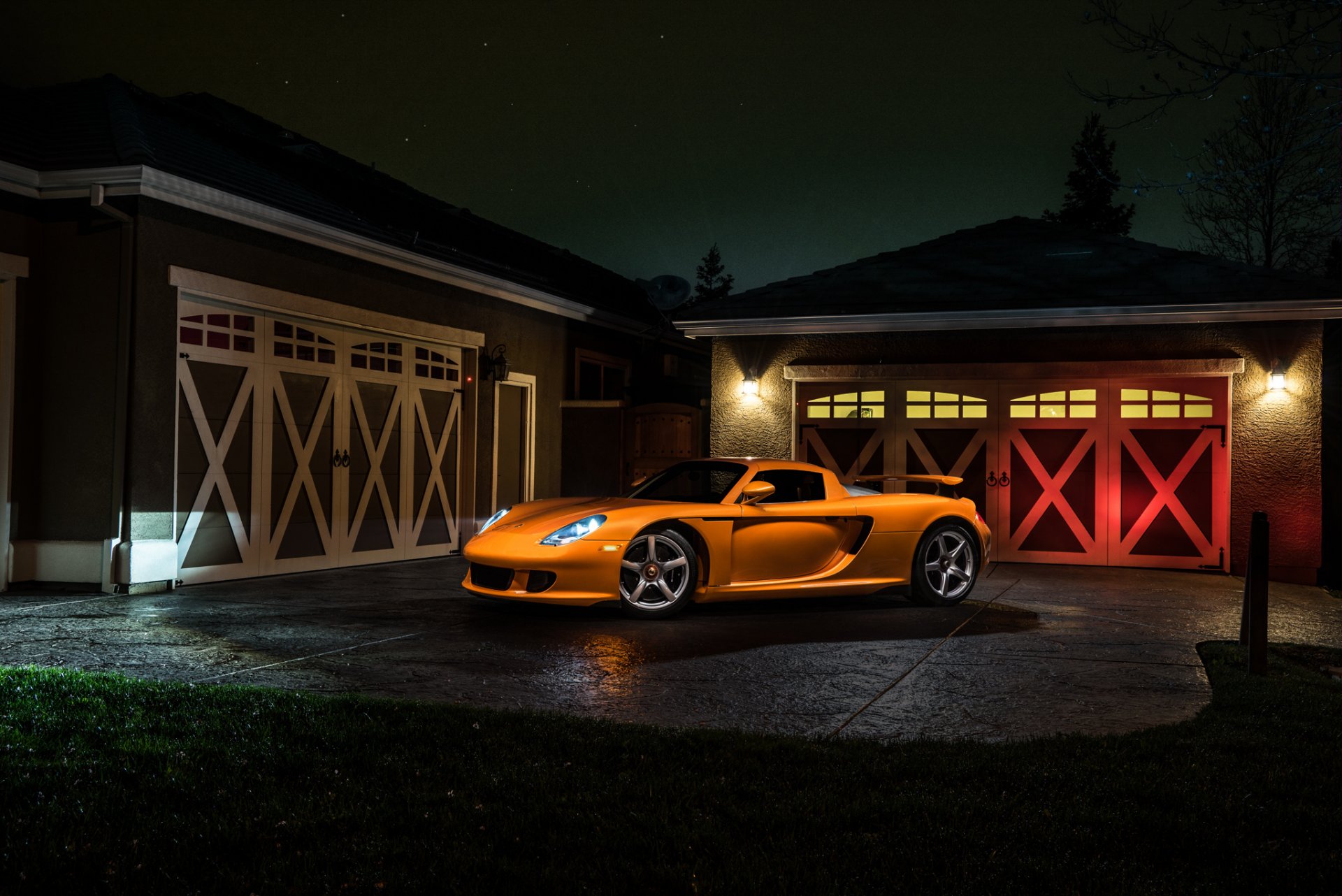 porsche carrera gt naranja borealis exótico superdeportivo luz nigth delantero