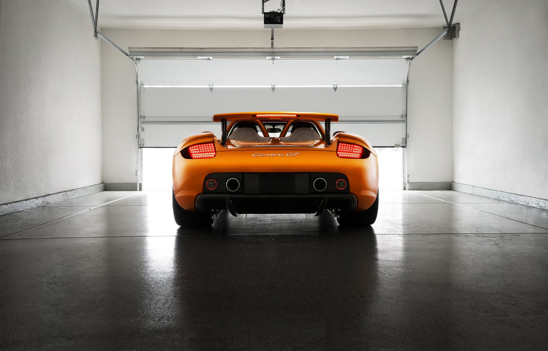 porsche carrera gt orange borealis exotic supercar light rear