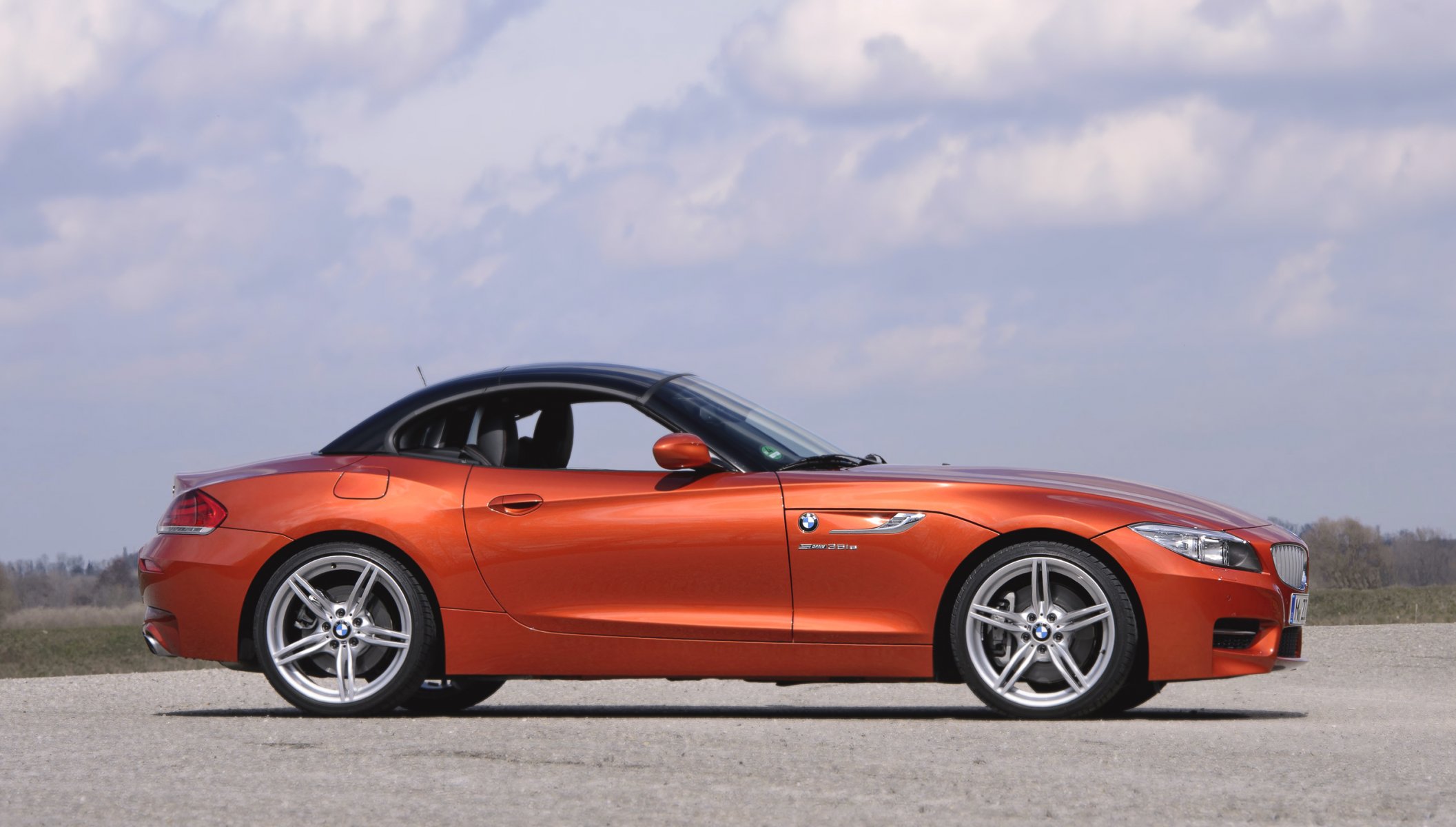 bmw z4 roadster auto bmw vista laterale ruota convertibile coupe auto boomer arancione