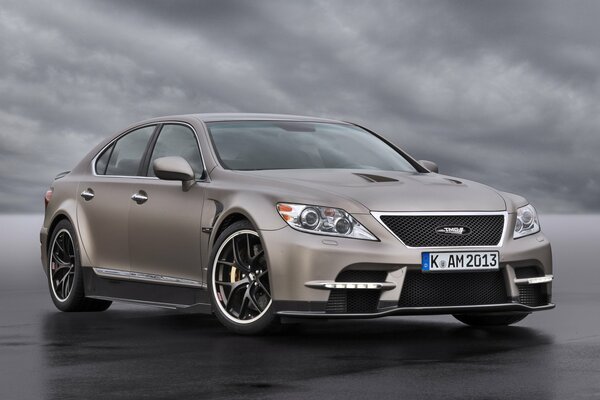 Silver lexus tmg against the sky