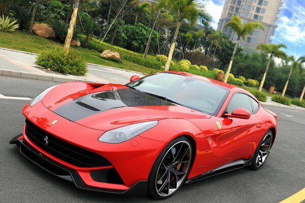 Tuning a red Ferrari for a gorgeous girl