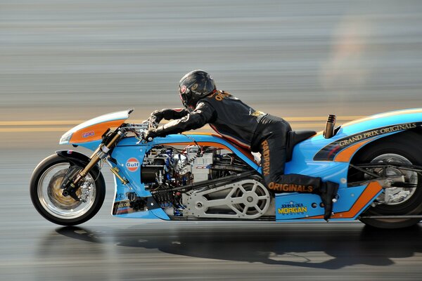 Riders on a bike rides at high speed