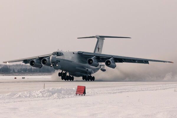 TAKE-OFF OF A TANKER AIRCRAFT FROM A WINTER AIRFIELD