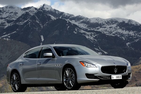 Maserati quattroporte car mountains sky