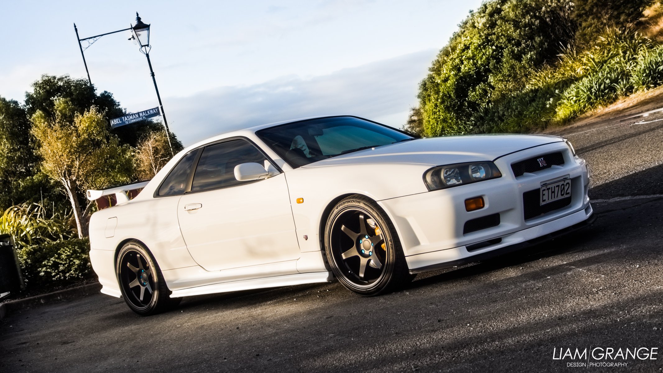 nissan horizon rtm gt-r r34 vspec vspec jdm voiture nissan skyline jaune jaune voiture coucher de soleil aube roues loup rayons pneus hankook liam grange