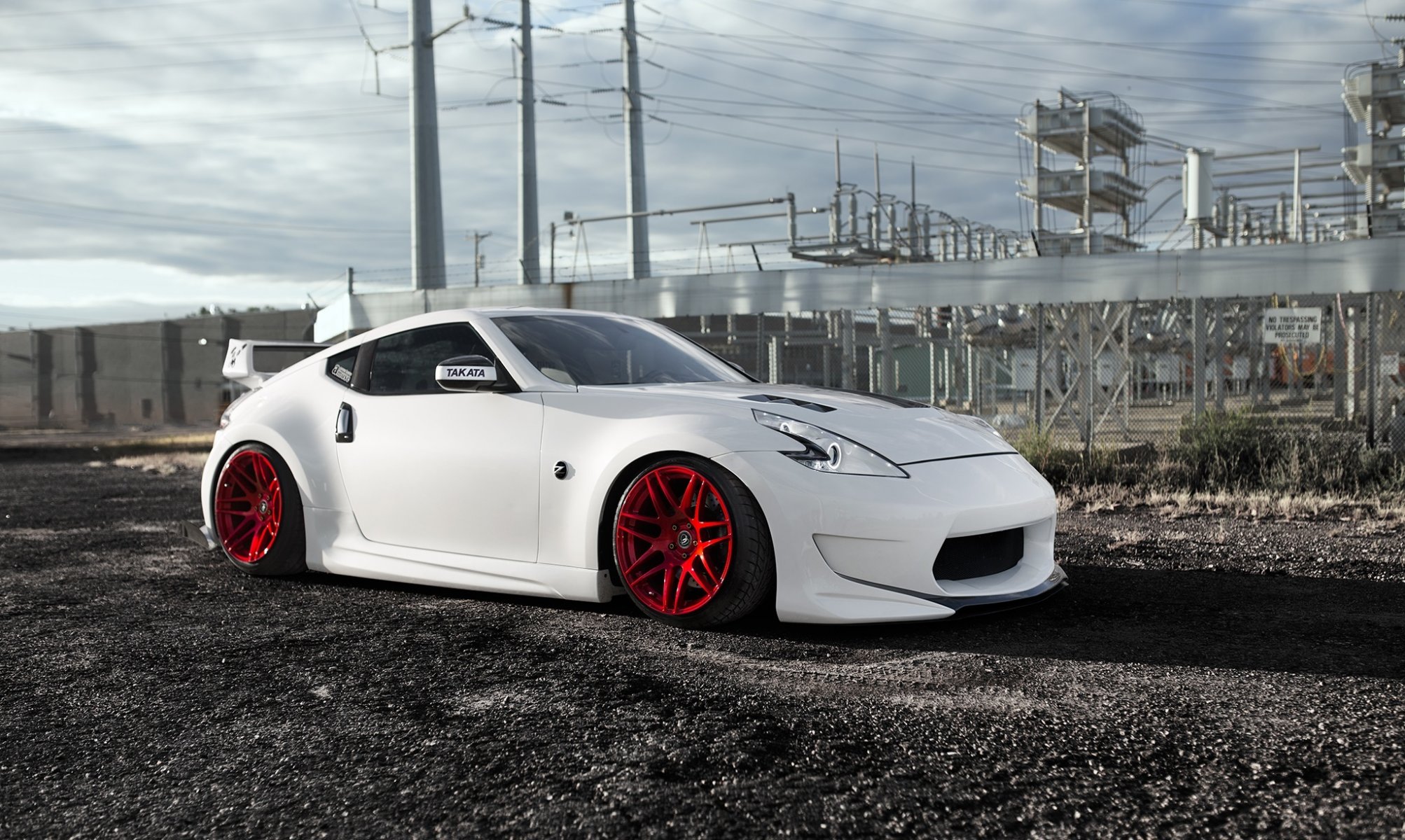 nissan 370z pure bloodlines white stance red wheels front