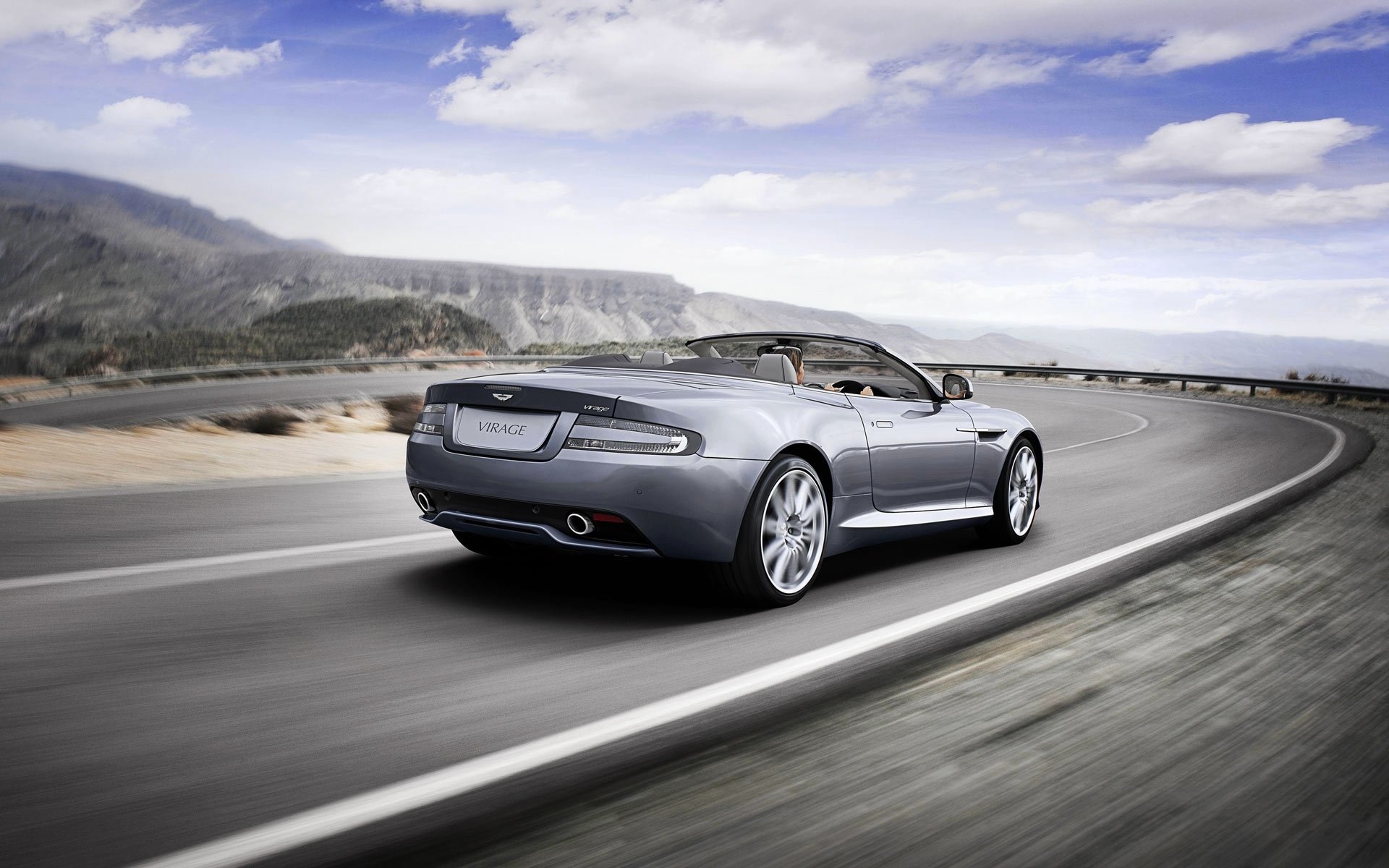 astonm kurve volante grau cabrio himmel auto aston martin wolken