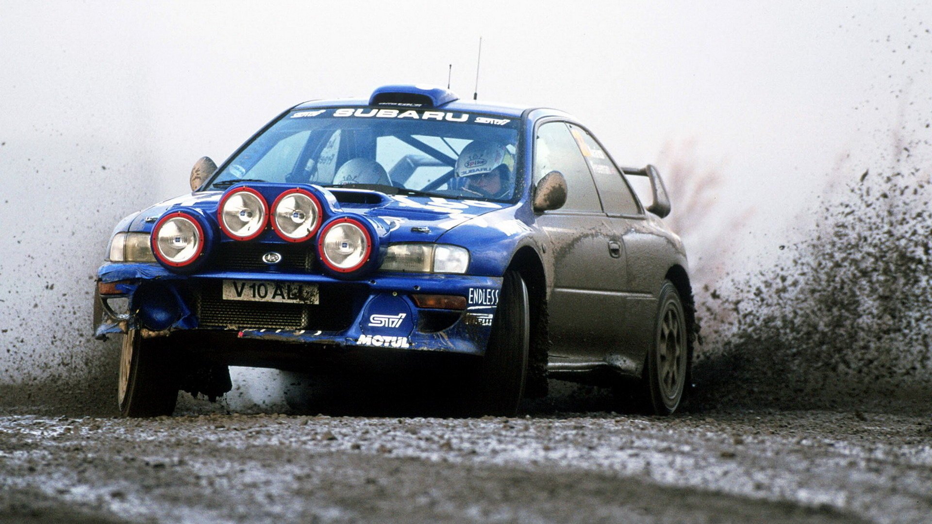 subaru rally subaru impreza auto strada spruzzi fango fari auto blu auto autovetture corse rally veicoli veicoli