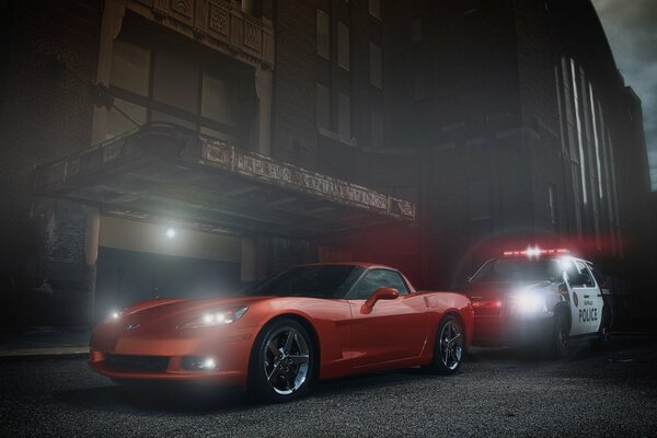 Voiture orange Chevrolet Corvette et police