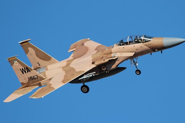 F-15 military aircraft flying in the sky