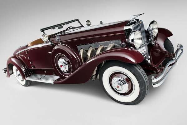 Painting of a burgundy convertible 1935, duesenberg, j 530/2563