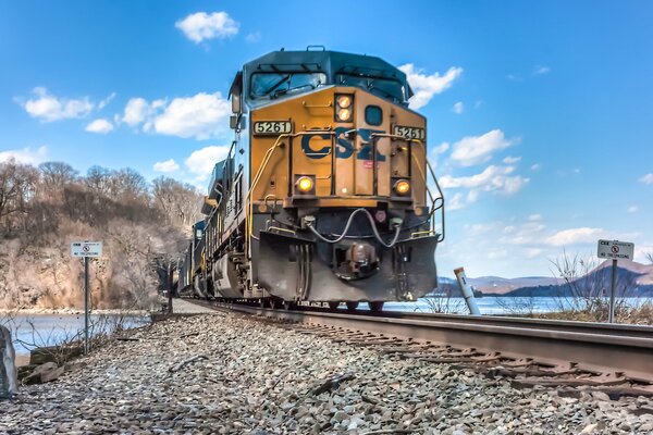 Locomotive on the tracks and nature