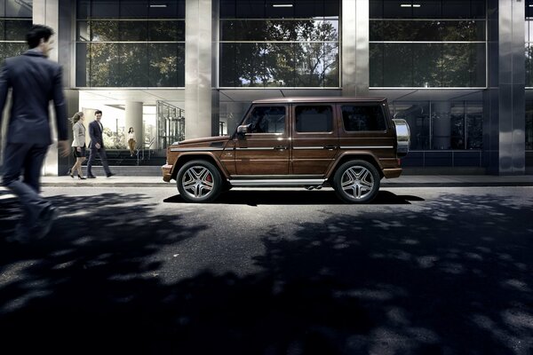 Mercedes amg g63 w463 2015 on the background of an office building