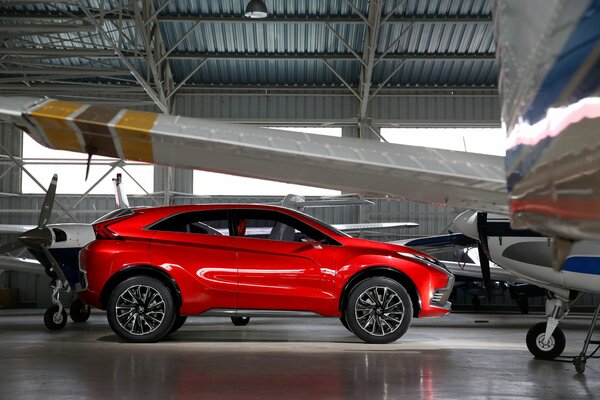 Red mitsubishi xr - PHEV ii car side view