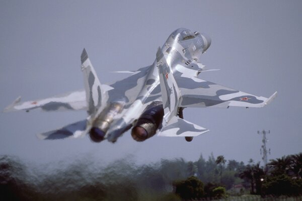 A large plane on takeoff for a mission