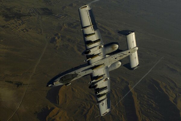 Maneuvers in the air of a bomber in the field