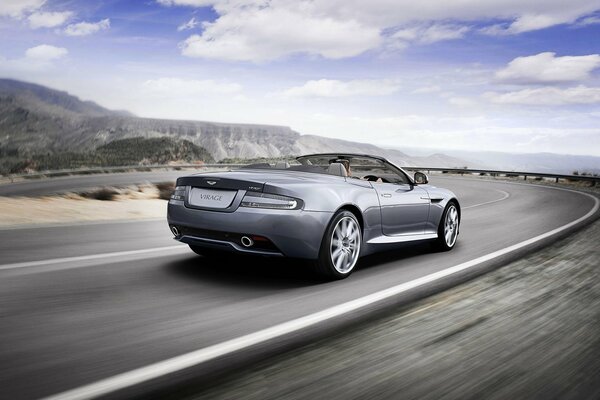 Aston Martin rides on the highway