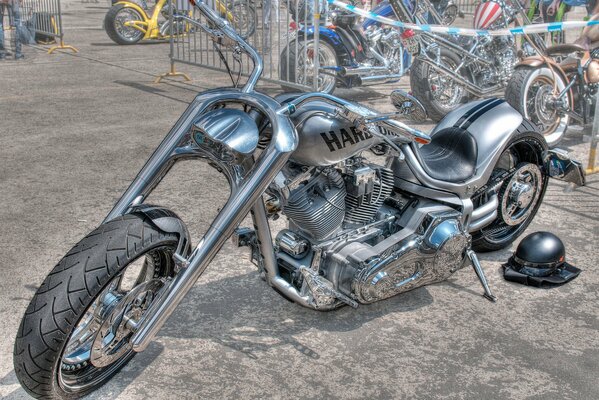 Silver motorcycle standing on the running board