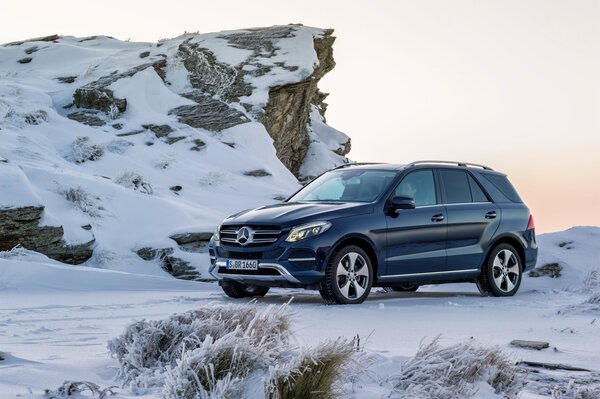 Beautiful Mercedes Benz in winter on a snowy road