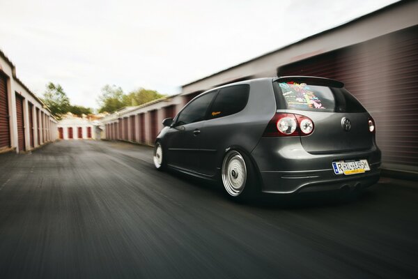 Grey Volkswagen Golf in motion