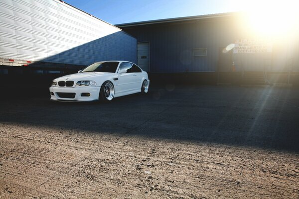 Bmw m3 e46 white near the garage