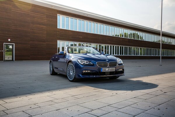 Bmw convertible on the background of a beautiful building