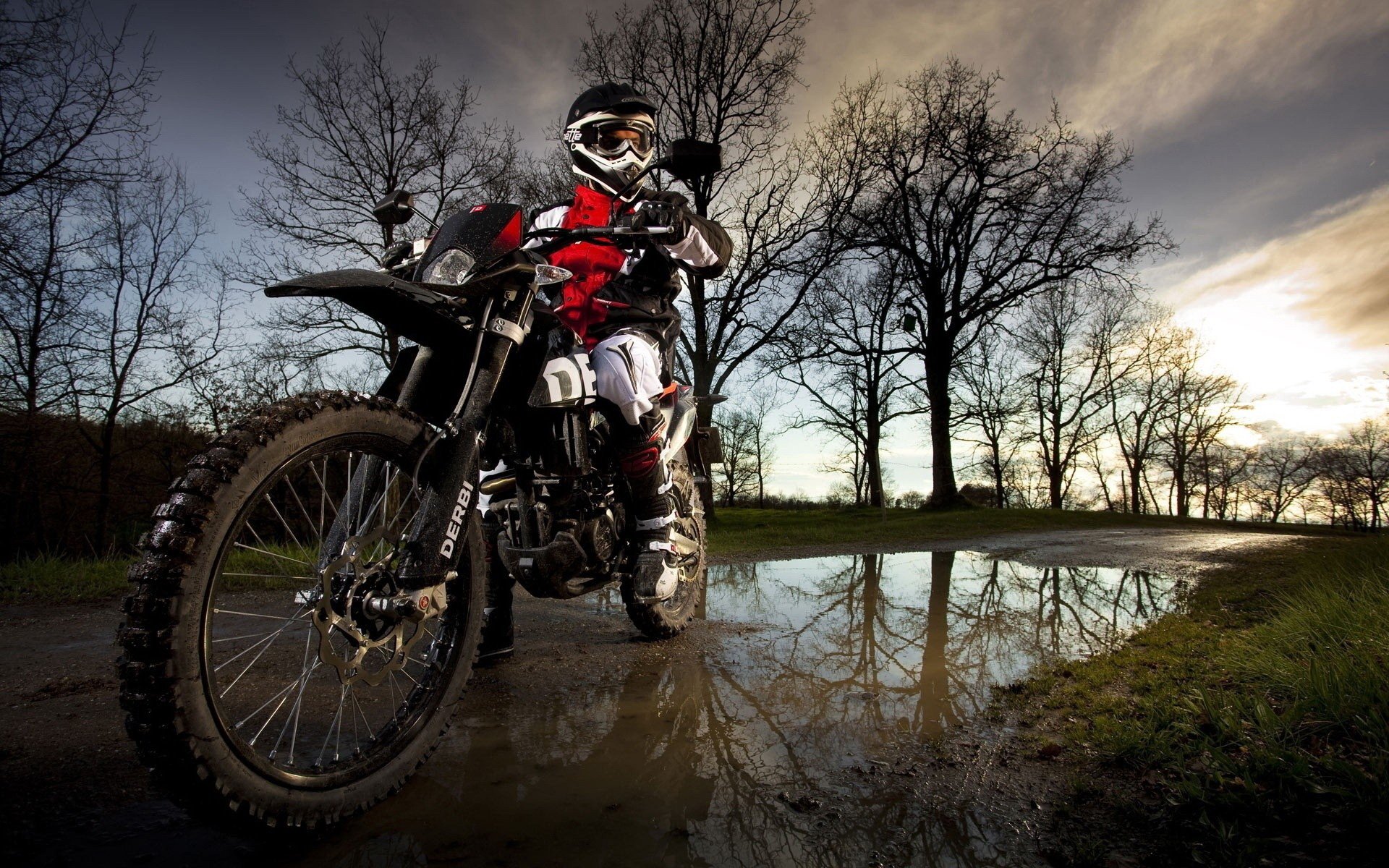 motorcycle road puddle nature men trees moto sport bike bike motor transport