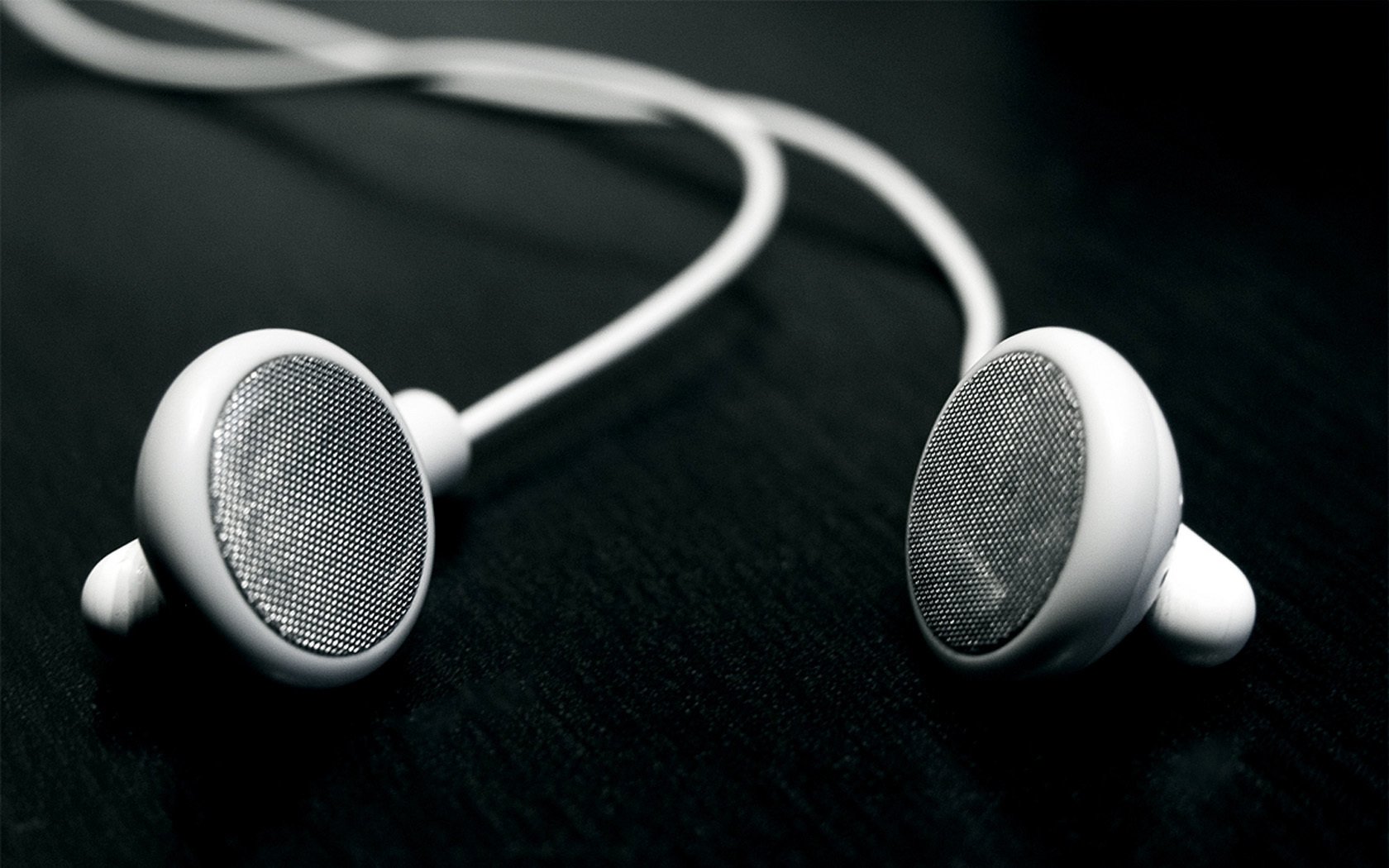 macro use white headphones black background music black and white