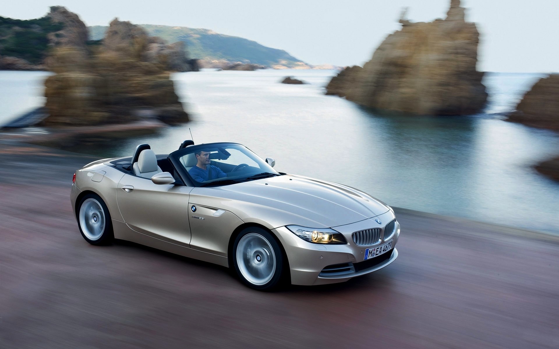 bmw z4 coche convertible mar costa en movimiento rocas bmw